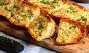 این نان خوشمزه فرانسوی را حتما در وعده غذایی خود بزارید