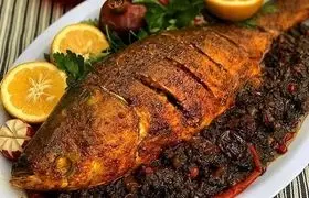 ماهی شکم‌پر یلدایی با سبزیجات معطر شمالی؛ مهمونی واقعی زیر پوست ماهی