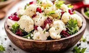 طرز تهیه سالاد انار و گل کلم محبوب زمستانی