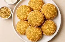 آموزش تهیه شیرینی کنجدی نارگیلی