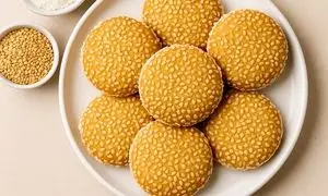 آموزش تهیه شیرینی کنجدی نارگیلی