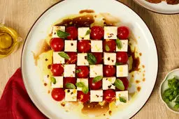 طرز تهیه پیش‌غذا با فتا و گوجه‌فرنگی گیلاسی