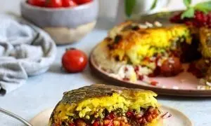 طرز تهیه ته‌چین آلو اسفناج | راز خوشمزه و خوشرنگ شدن ته چین لو رفت!